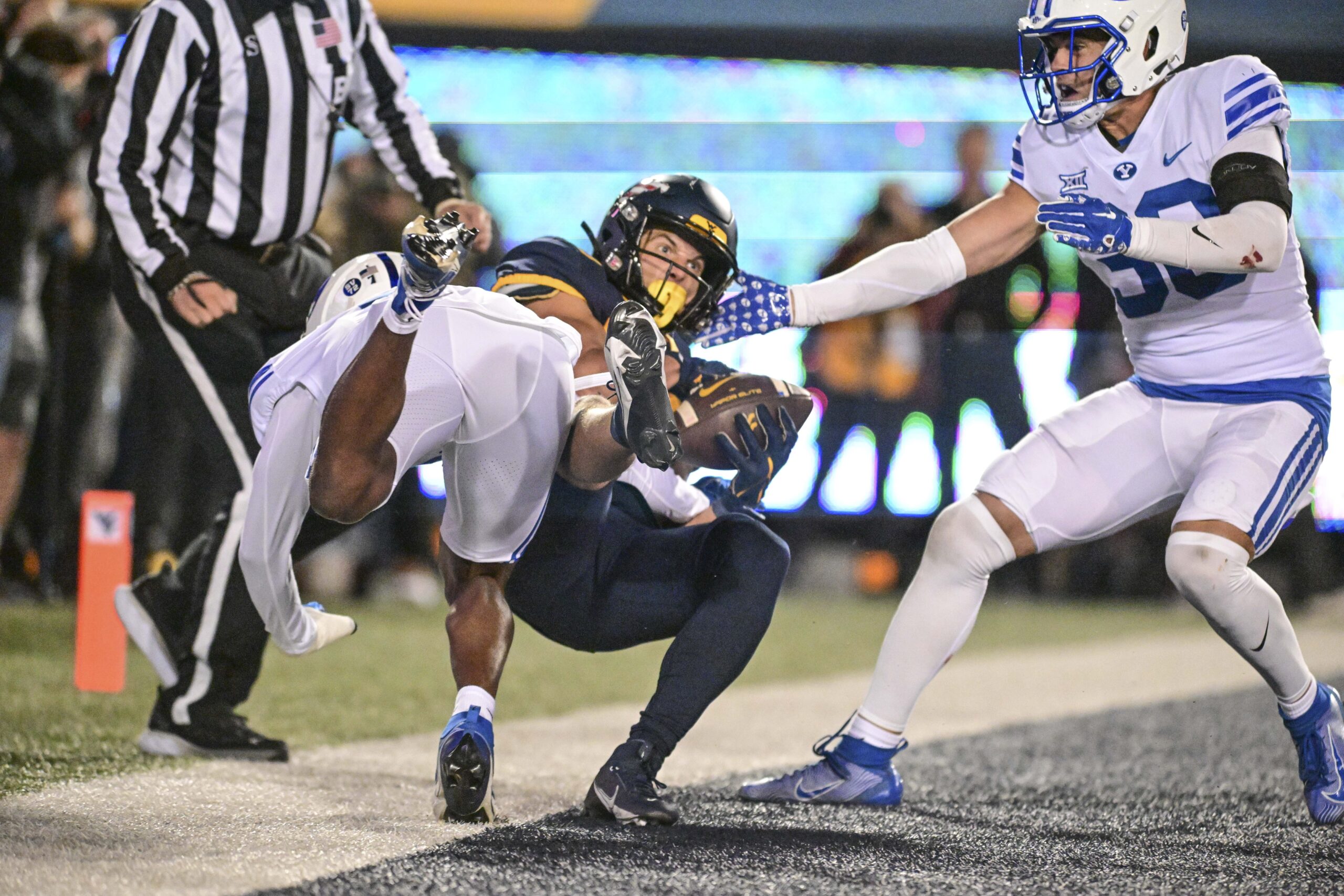 West Virginia gets strong rushing efforts from Jahiem White and CJ Donaldson in a 37-7 win over BYU